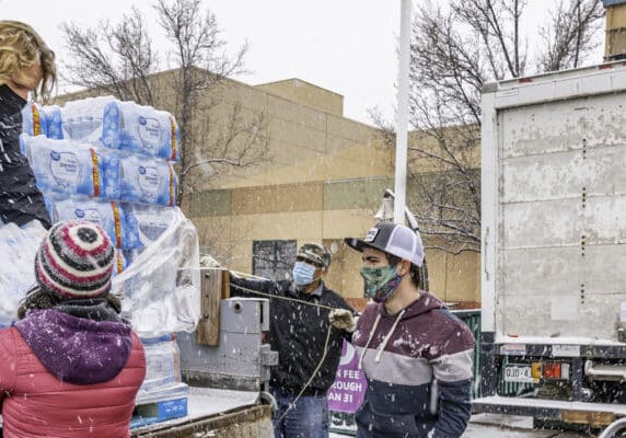 Humanitarian aid workers handing out water