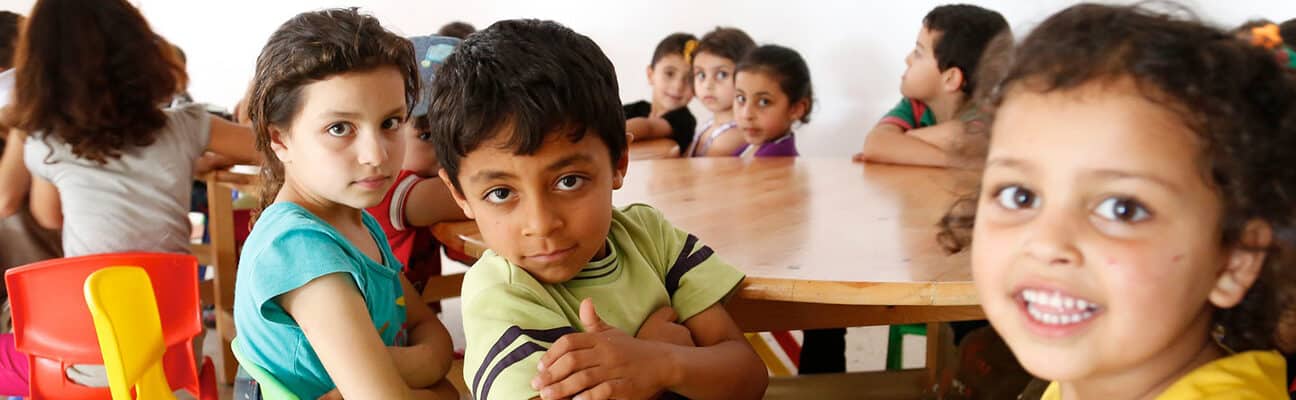 Syrian primary school children attending catch-up learning classes in Lebanon