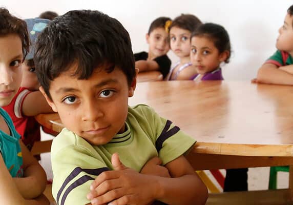 Syrian primary school children attending catch-up learning classes in Lebanon