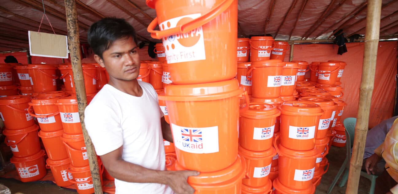 Distributing UK aid hygiene kits to Rohingya refugees in Bangladesh