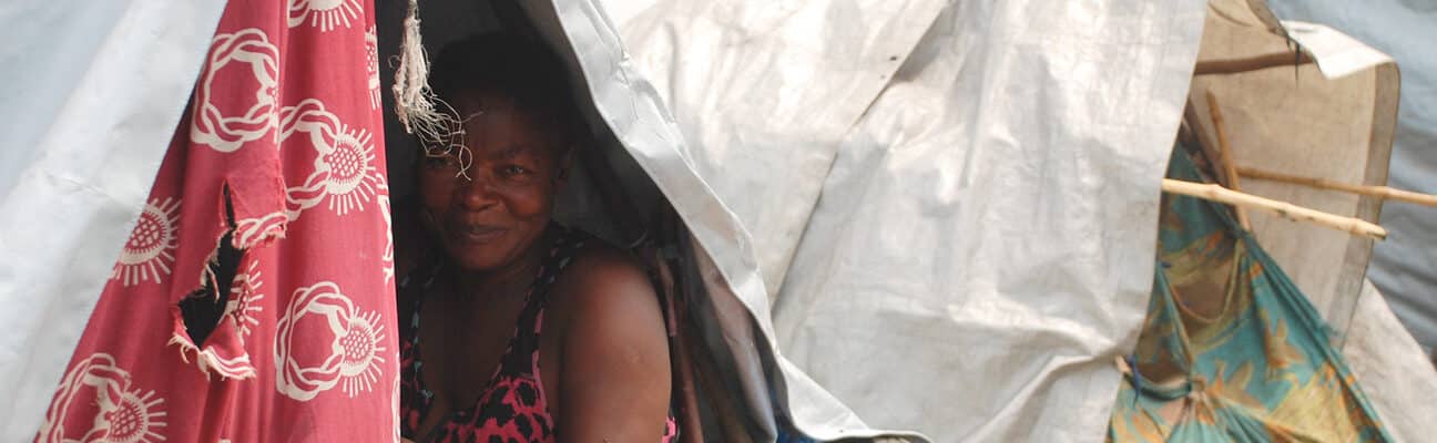 A woman in her shelter in Kanyaruchinya