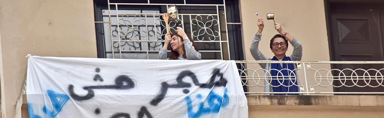 People in Lebanon share ABAAD’s hotline number from their balconies to encourage women experiencing domestic violence to seek help.