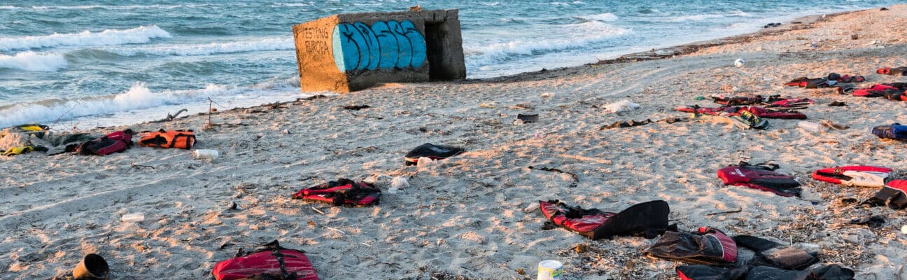 Abandoned lifejackets on a beach