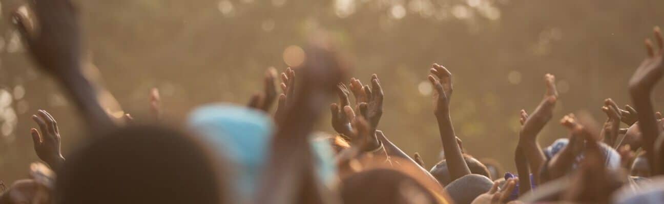 People with arms in the air