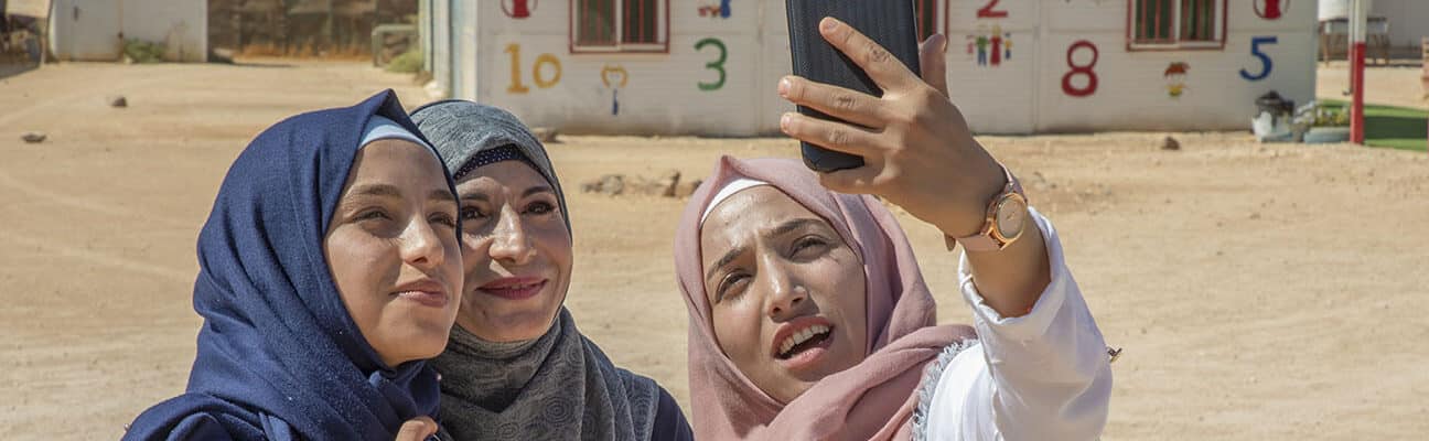 Rama*, 14 (L), and her sister Hiba*, 17(R), in Za’atari camp for Syrian refugees, Jordan. *names changes