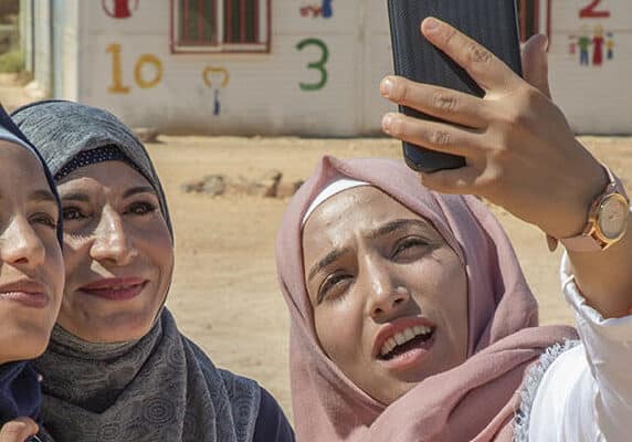 Rama*, 14 (L), and her sister Hiba*, 17(R), in Za’atari camp for Syrian refugees, Jordan. *names changes