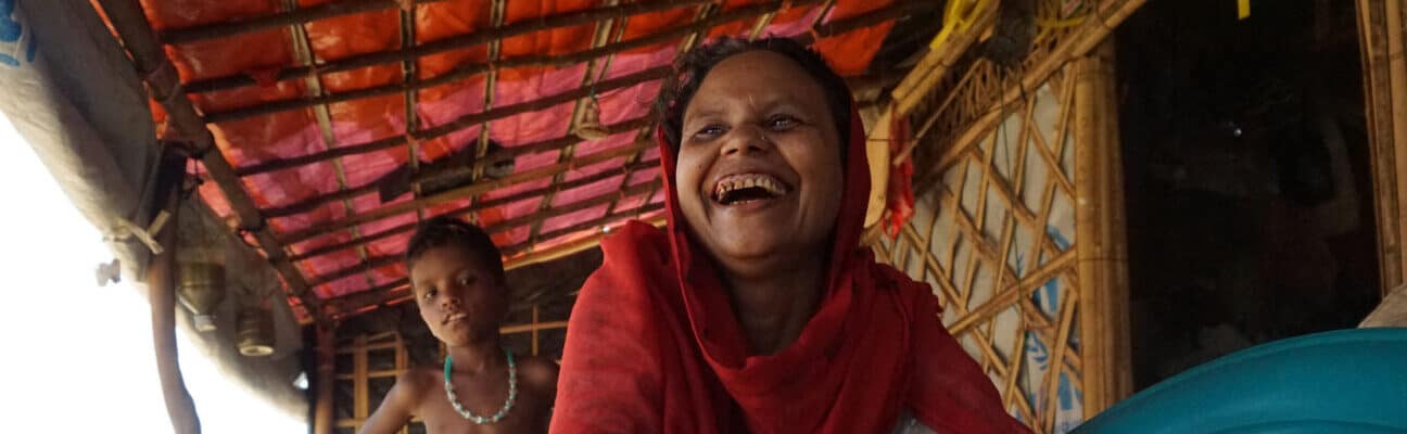 Refugee woman with her rabbits in Bangladesh