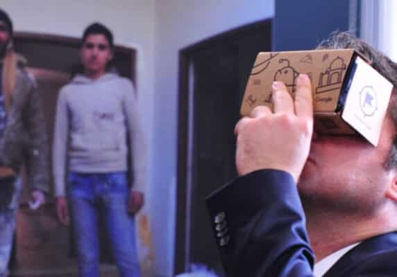 Man at the virtual reality stand- UK Aid