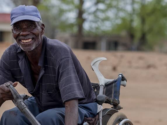 Ezekiel Rukuruva, 62, preparing a rainwater channel near his home in a food-insecure area of Chiredzi, Zimbabwe, and linked to us through CBM-partner Jairos Jiri Association.