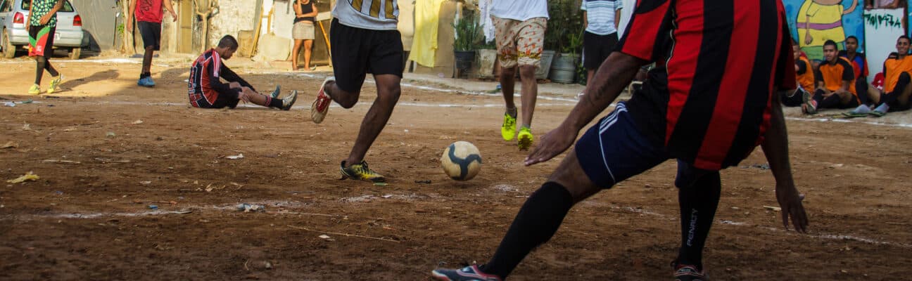 Football match in Favela Moinho São Paulo, Brazil