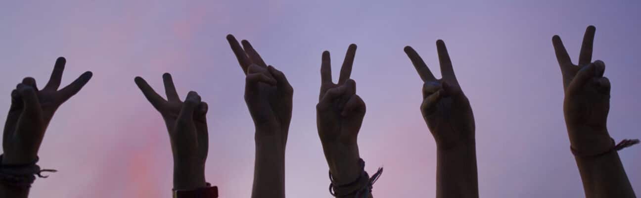 Hands making a peace sign