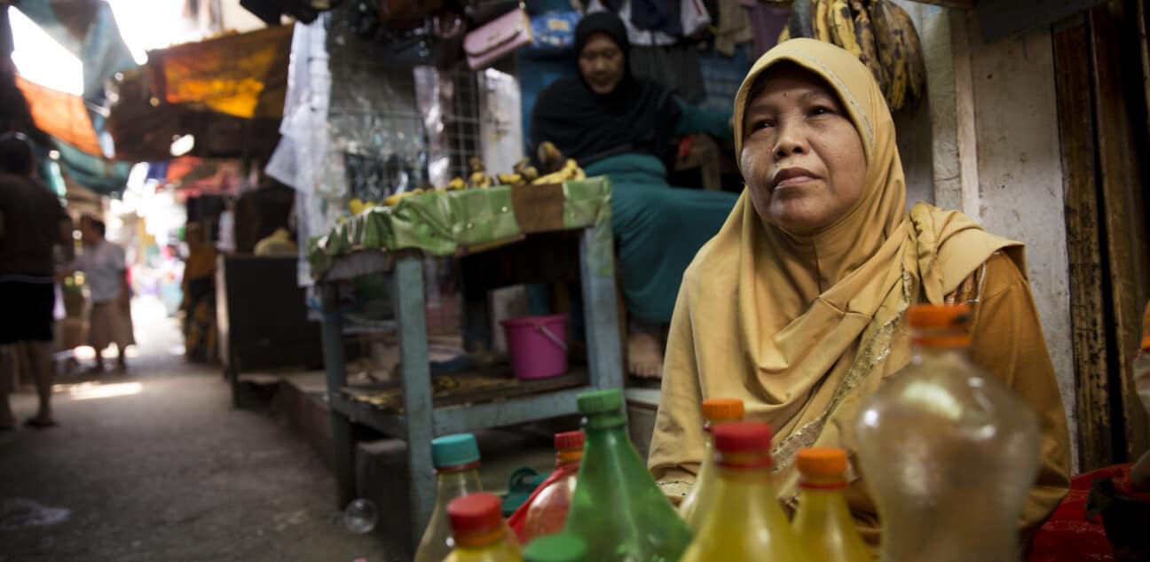 Woman in street in Prumpung, Jakarta, Indonesia