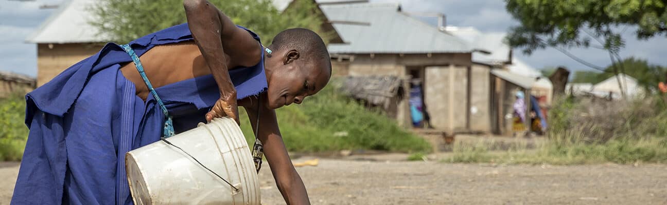 A women collects water in Tanzania