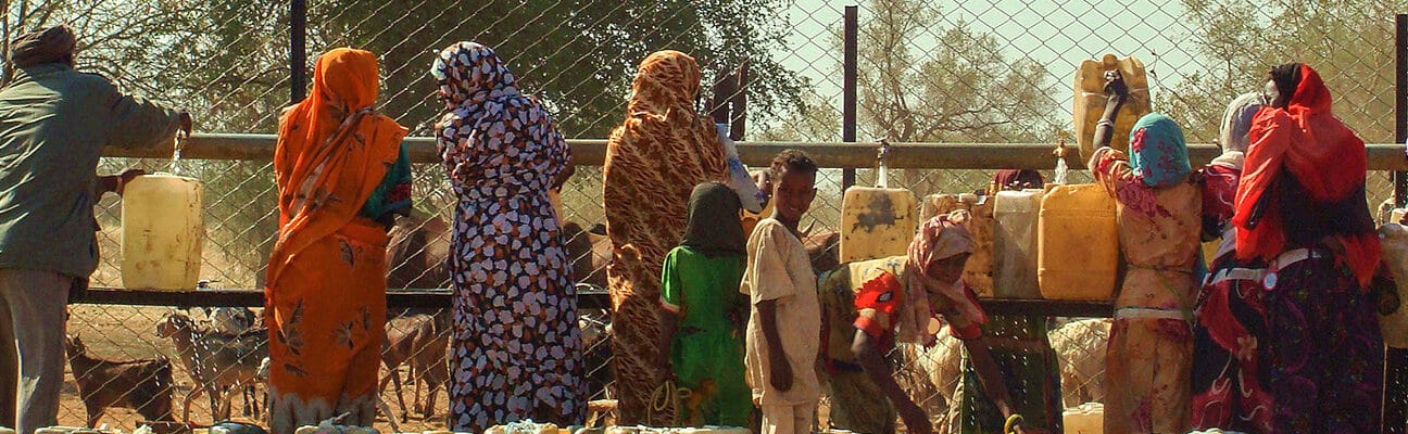 Sudanese women waiting in line to fetch water in Al Fashir, capital of North Darfur, Sudan.