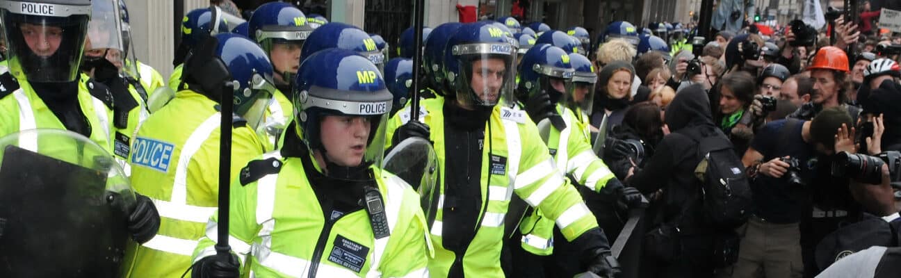 Police clash with protesters at an anti-austerity rally in 2011