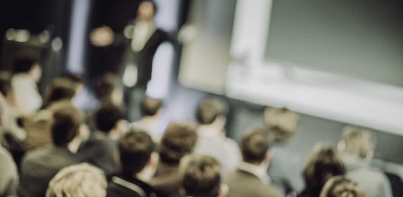 People listening to a presentation