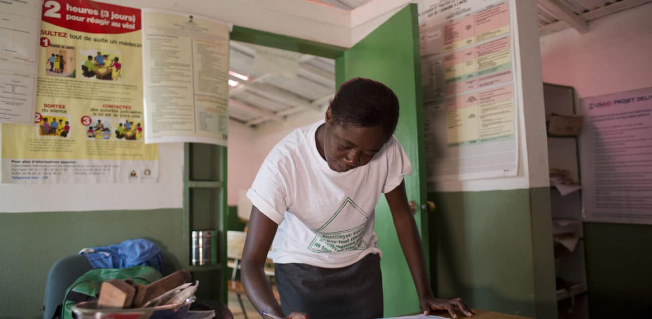 Woman in Haiti filling in form