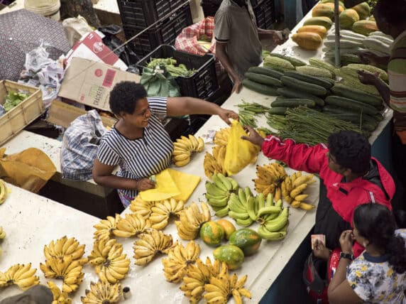 Woman in Seychelles selling bananas