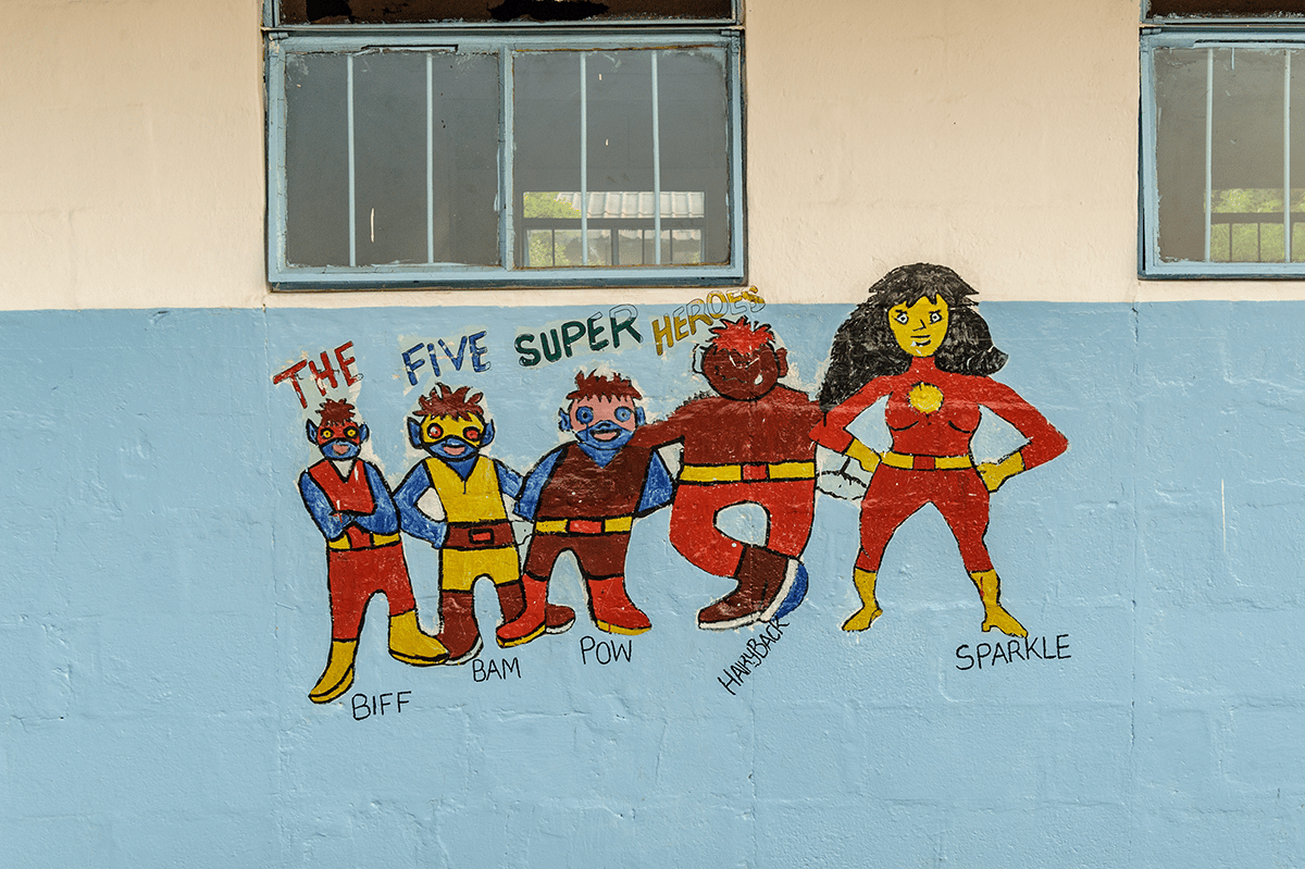 Sightsavers superheroes painted on wall