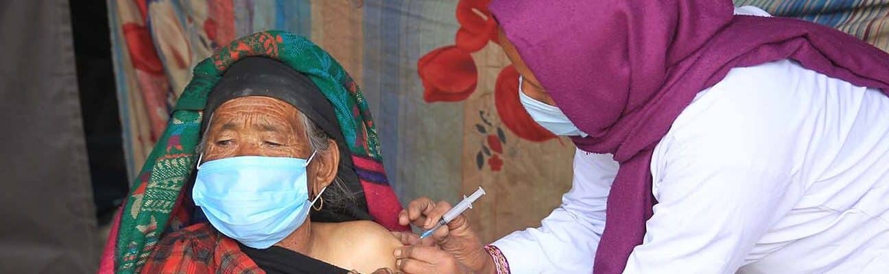 An 81 year old women receiving a vaccine in Nepal. UNICEF