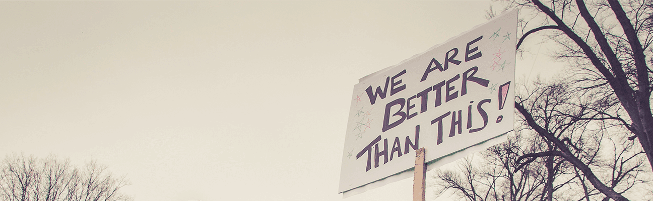 Woman holding a placard on a march