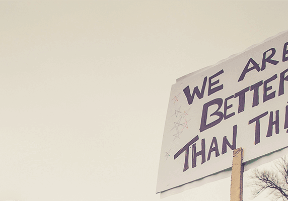 Woman holding a placard on a march