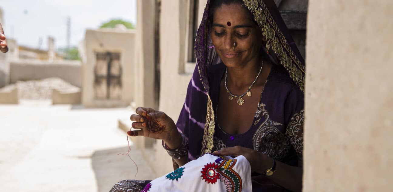Woman stitching some clothing