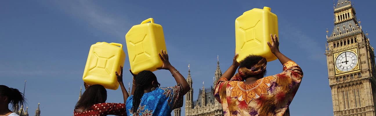 Women recreate African tradition in London urging Gordon Brown to end water poverty at the G8