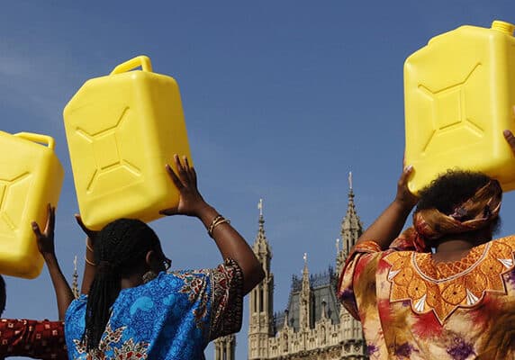 Women recreate African tradition in London urging Gordon Brown to end water poverty at the G8