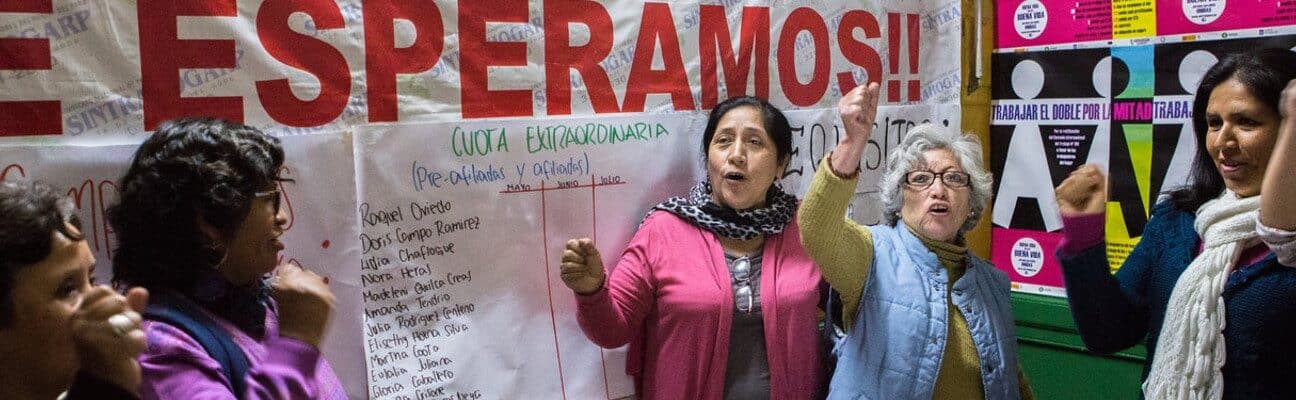 Paulina Luza (centre-left), Secretary-General of Peru's Domestic Workers' Union with other members at the union's headquarters. Lima, Peru (August 2015) © JUAN ARREDONDO/GETTY IMAGES.