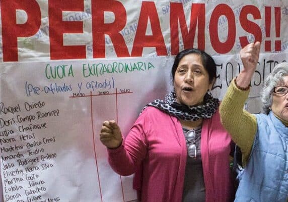Paulina Luza (centre-left), Secretary-General of Peru's Domestic Workers' Union with other members at the union's headquarters. Lima, Peru (August 2015) © JUAN ARREDONDO/GETTY IMAGES.