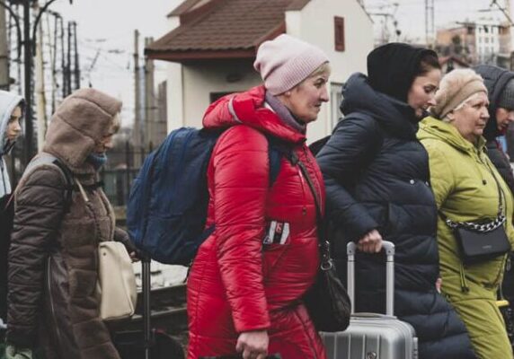 Ukrainians arriving at the train station in Lviv, Ukraine