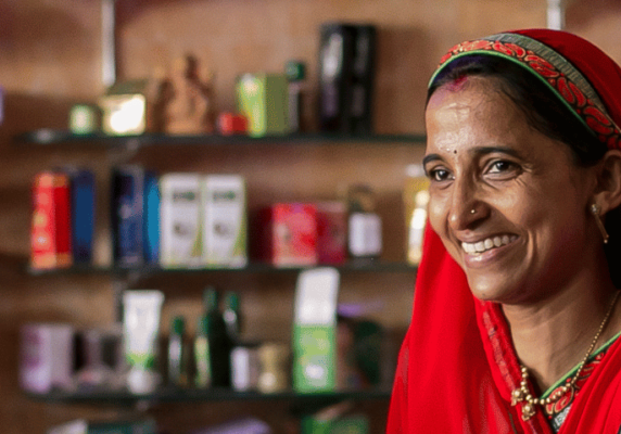 Pinky Joshni working at her textiles shop in Udaipur, India. Credit: Allison Joyce