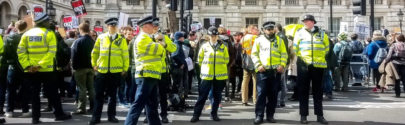 Police officers on duty at a protest on Whitehall. Credit: Garry Knight