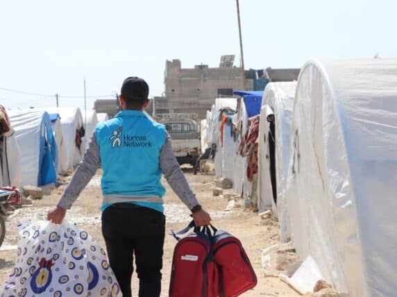 Hurras’ teams in Northwest Syria distributing winter and school kits to children whose families lost their homes as a result of the earthquake in February.