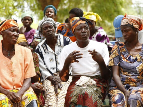 Ayipele Agomanap, 41, an Epilepsy survivor explains her situation to other members of her self-help group in Sandema, Northern Ghana. Self-help groups serve as solidarity platforms for members and facilitate their access to health and micro-economic programmes.