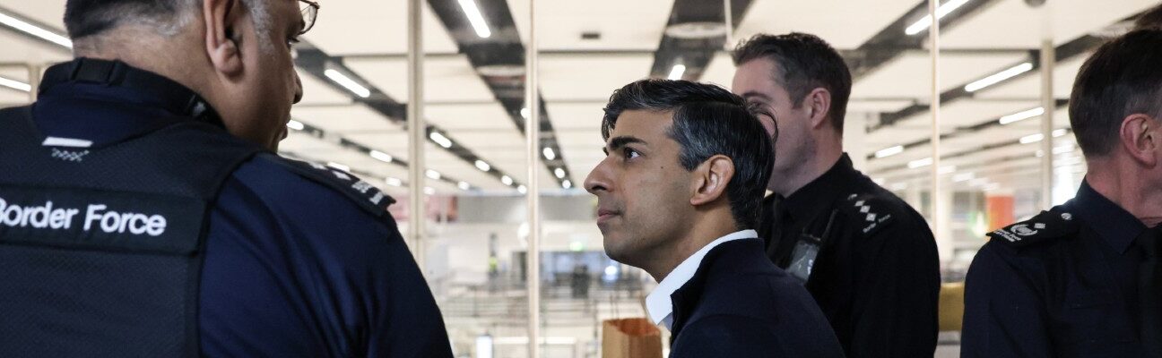 Rishi Sunak speaks with Border Force staff as he visits the south terminal at Gatwick Airport. Picture by Simon Dawson / No 10 Downing Street