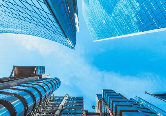 Upwards shot of buildings with the sky in the middle