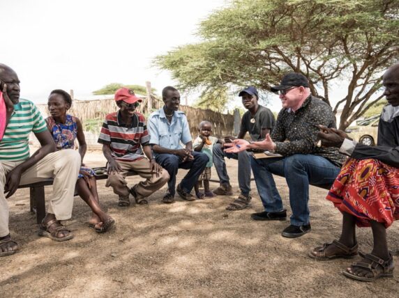 A meeting of participants in inclusive humanitarian project in response to drought in Turkana, Kenya, with CBM UK partner Kenya Red Cross Society. CBM UK/Eshuchi