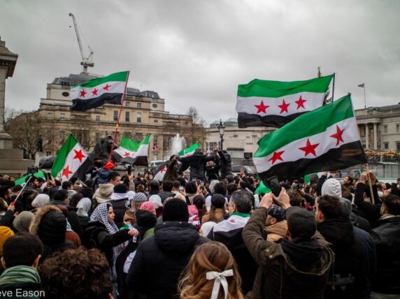 Syrian opposition supporters celebrate the fall of Damascus, Trafalgar Square, London 8th December 2024. Credit: Steve Eason
