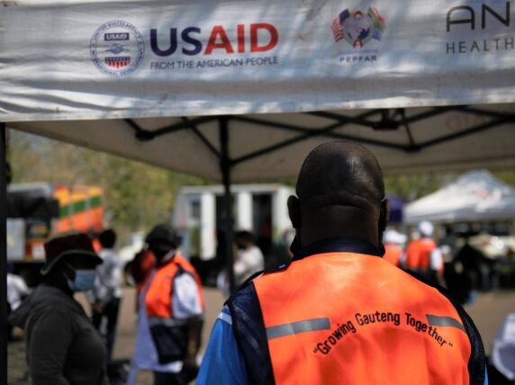 Volunteer at a USAID mobile vaccine clinic in South Africa. Photo by USAID/South Africa