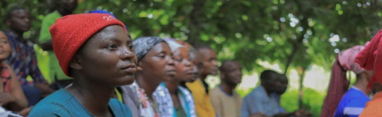 Feedback session between the Locally Led ERF team and partner communities in Bundibugyo, Uganda, an area heavily hit by floods. Photo by Oxfam Uganda