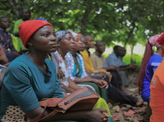 Feedback session between the Locally Led ERF team and partner communities in Bundibugyo, Uganda, an area heavily hit by floods. Photo by Oxfam Uganda