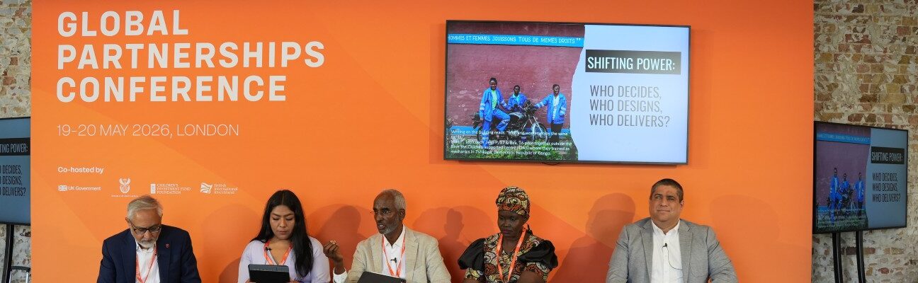 Delegates speaking on day 2 of the Global Partnerships Conference, in the Spotlight Session 'Shifting the Power: who decides, who designs, who delivers? (Save the Children). Picture: Ed Morris/FCDO