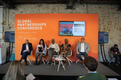 Delegates speaking on day 2 of the Global Partnerships Conference, in the Spotlight Session 'Shifting the Power: who decides, who designs, who delivers? (Save the Children). Picture: Ed Morris/FCDO