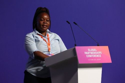 Grace Yolanda Tembo, Zimbabwean youth advocate, speaks at the opening plenary session of the Global Partnerships Conference. Credit: Russell Watkins/FCDO/CC BY 4.0