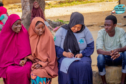 A youth advocate documents insights during an inclusive adolescent nutrition dialogue in Bauchi State, Nigeria, part of a listening campaign to amplify young people’s voices on malnutrition. With thanks to Finian Ali, SUN CSN Youth Coordinator for Nigeria. Credit: Scaling Up Nutrition Civil Society Network (SUN CSN)