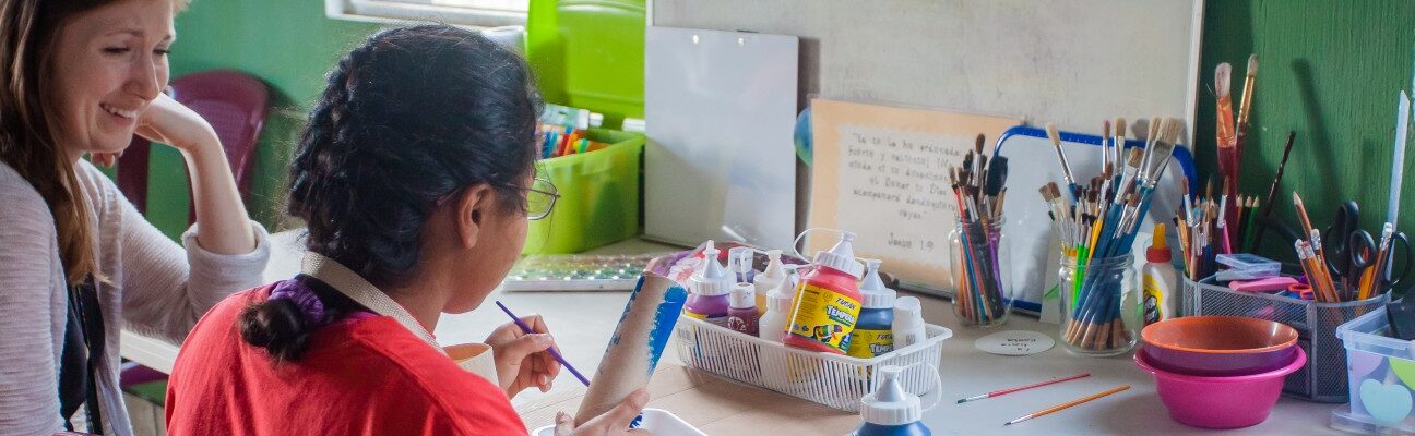 A Kids Alive therapist with a child. Credit: Kids Alive International